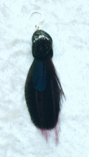 Svart, lila med snöflingeobsidian